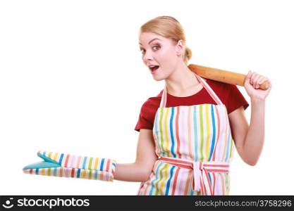 Happy housewife or baker chef wearing kitchen apron oven mitten holds baking rolling pin showing empty copy space presenting with open hand palm isolated on white