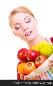 Happy housewife or seller offering healthy fruits isolated studio shot. Diet and nutrition.