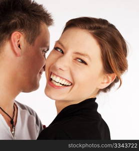 Happy joyful beautiful young woman laughing