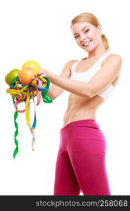 Happy joyful young woman girl holding grapefruits and tape measures. Slimming and dieting. Healthy lifestyle nutrition concept. Isolated on white.. Happy woman holding grapefruits and tape measures.