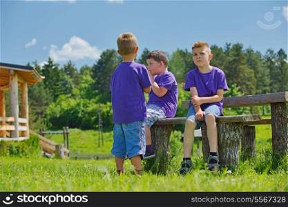 happy kids group have fun in nature outdoors park