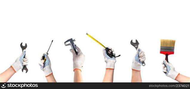 Happy labor day. Hands hold repair tools on a white background. Hand tools for construction. Screwdriver, pliers, brush, wrench.. Happy labor day. Hands hold repair tools on white background. Hand tools for construction. Screwdriver, pliers, brush, wrench.