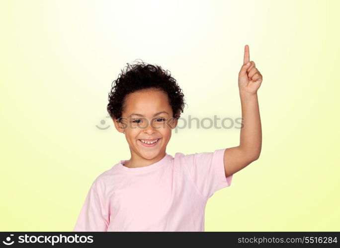 Happy latin child asking to speak isolated on yellow background
