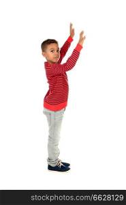 Happy latin child dancing isolated on a white background