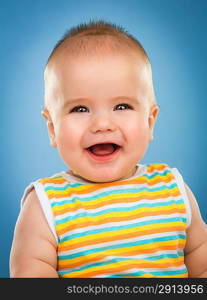 Happy Little Baby isolated on a blue background.