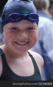 Happy Little Freckled Girl Wearing Swimming Cap