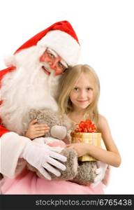 Happy Little Girl Hugs Santa with Christmas Gift at the White Background