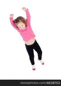 Happy little girl in pink jumping isolated on a white background