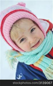 Happy little girl in winter portrait
