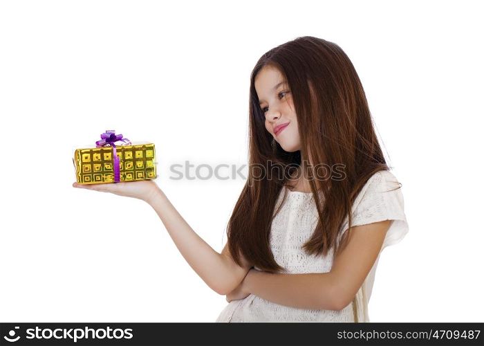 Happy little girl with gift box, studio on white background