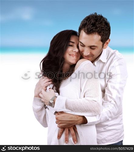 Happy lovers on vacation, young arabic family hugging on the beach, spending time together, romantic relationship, love concept