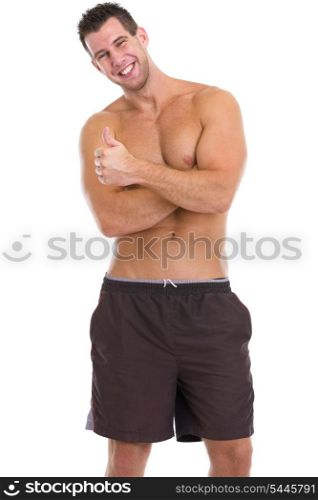 Happy male athlete showing thumbs up
