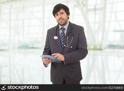 happy male doctor, at the hospital