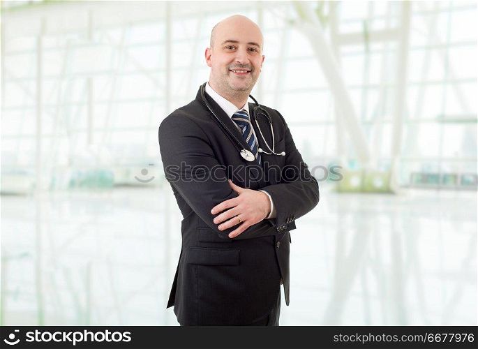 happy male doctor at the hospital