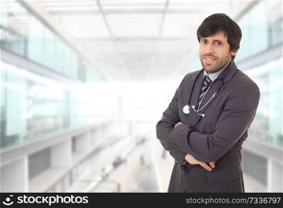 happy male doctor, at the hospital