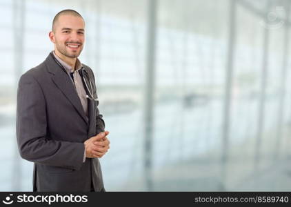 happy male doctor, at the hospital