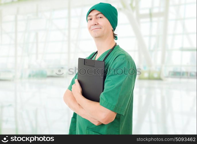 happy male doctor at the hospital. doctor