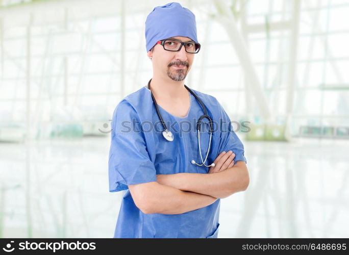 happy male doctor at the hospital. doctor