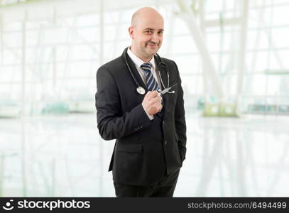 happy male doctor, at the hospital. doctor