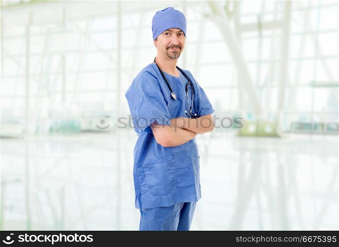 happy male doctor at the hospital. doctor