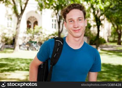 Happy male student on a university campus