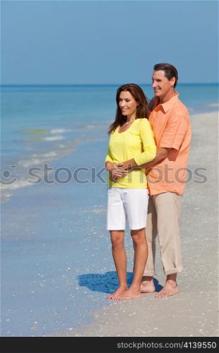 Happy, Man and Woman Couple Embracing on An Empty Beach