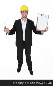 Happy man holding clip-board and pen