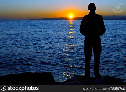 Happy man in sunrise