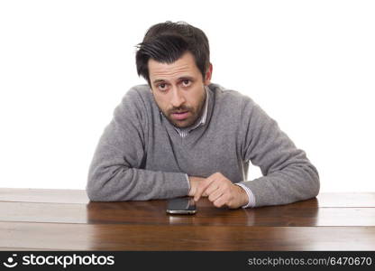 happy man on a desk on the phone, isolated. on the phone