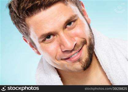 Happy man with half shaved face beard hair.. Portrait of happy man with half shaved face beard hair. Smiling handsome guy on blue. Skin care and hygiene.