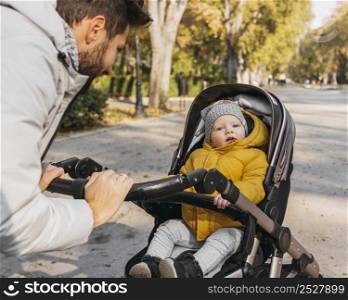 happy man with his child outside nature