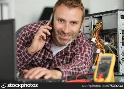 happy man worker on the phone