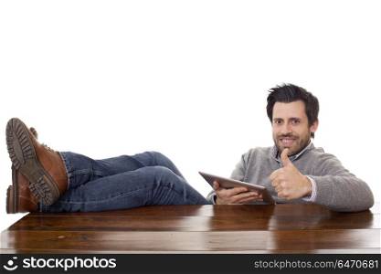 happy man working on a desk with a tablet pc, isolated. happy man working