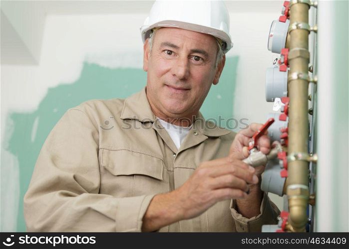 happy man working water meters