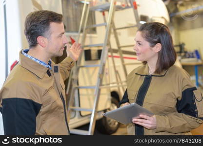 happy managers in the warehouse