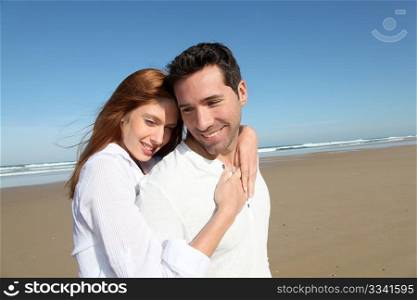 Happy married couple at the beach