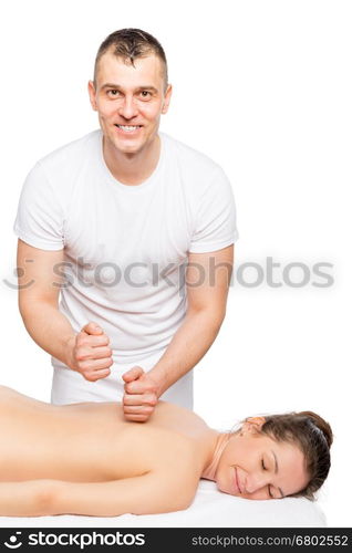 Happy massage therapist and the patient relax on a massage table