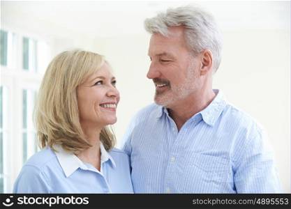 Happy Mature Couple At Home Together