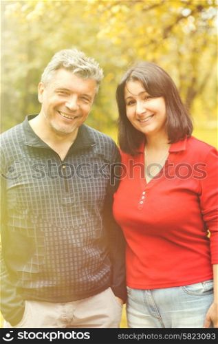 Happy mature couple outdoors portrait