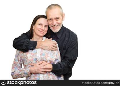Happy mature man and woman smiling for S. Valentine's day or anniversary and embracing each other. Isolated on white background.