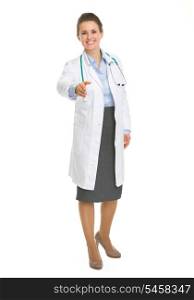 Happy medical doctor woman stretching hand for handshake