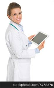 Happy medical doctor woman with tablet pc