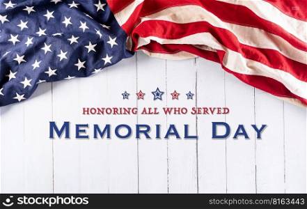 Happy memorial day concept made from american flag with text over white wooden background