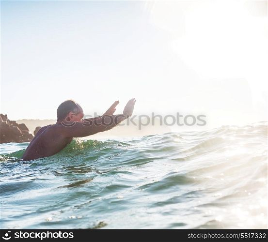 happy men in ocean