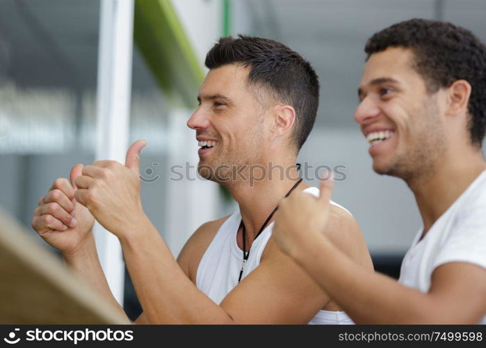 happy men in the gym