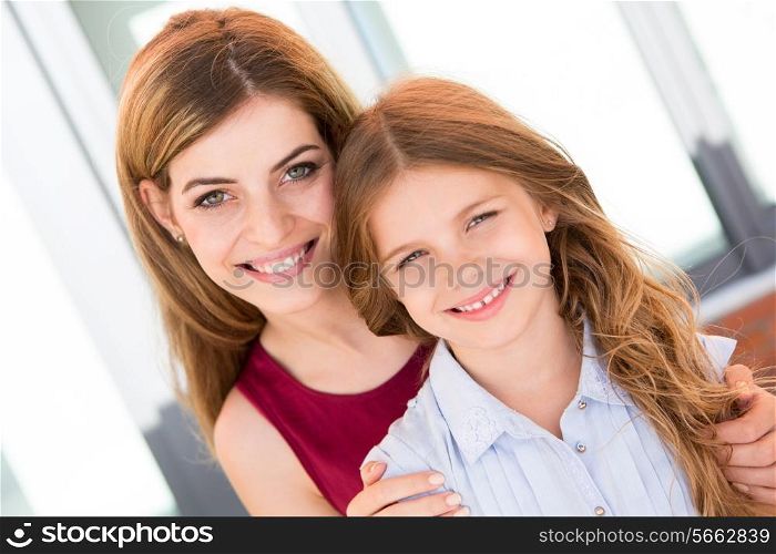 Happy mother and daughter enjoying the day