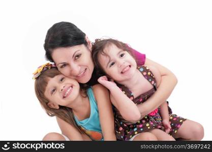 Happy mother and two daughters. Isolated on white background