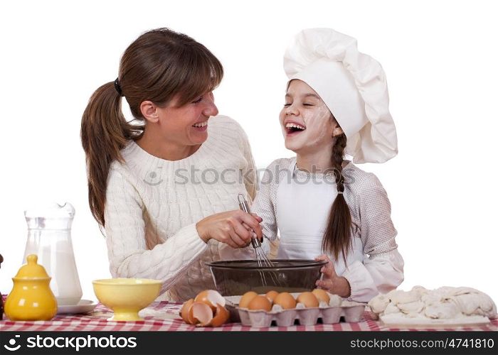 Happy mother with little daughter joyful cooking, isolated on white background