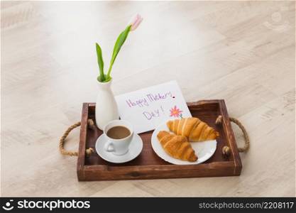 happy mothers day inscription with coffee tray