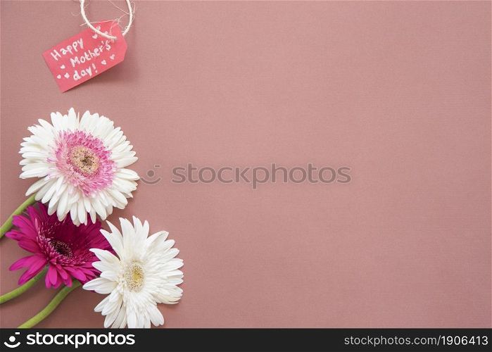 happy mothers day inscription with gerbera flowers. High resolution photo. happy mothers day inscription with gerbera flowers. High quality photo